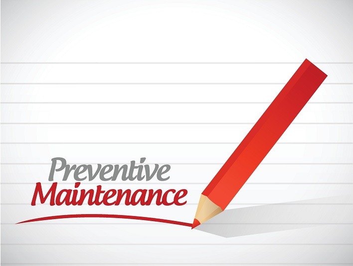 A red pencil underlines the words Preventive Maintenance written in stylized gray and red text on a lined background.
